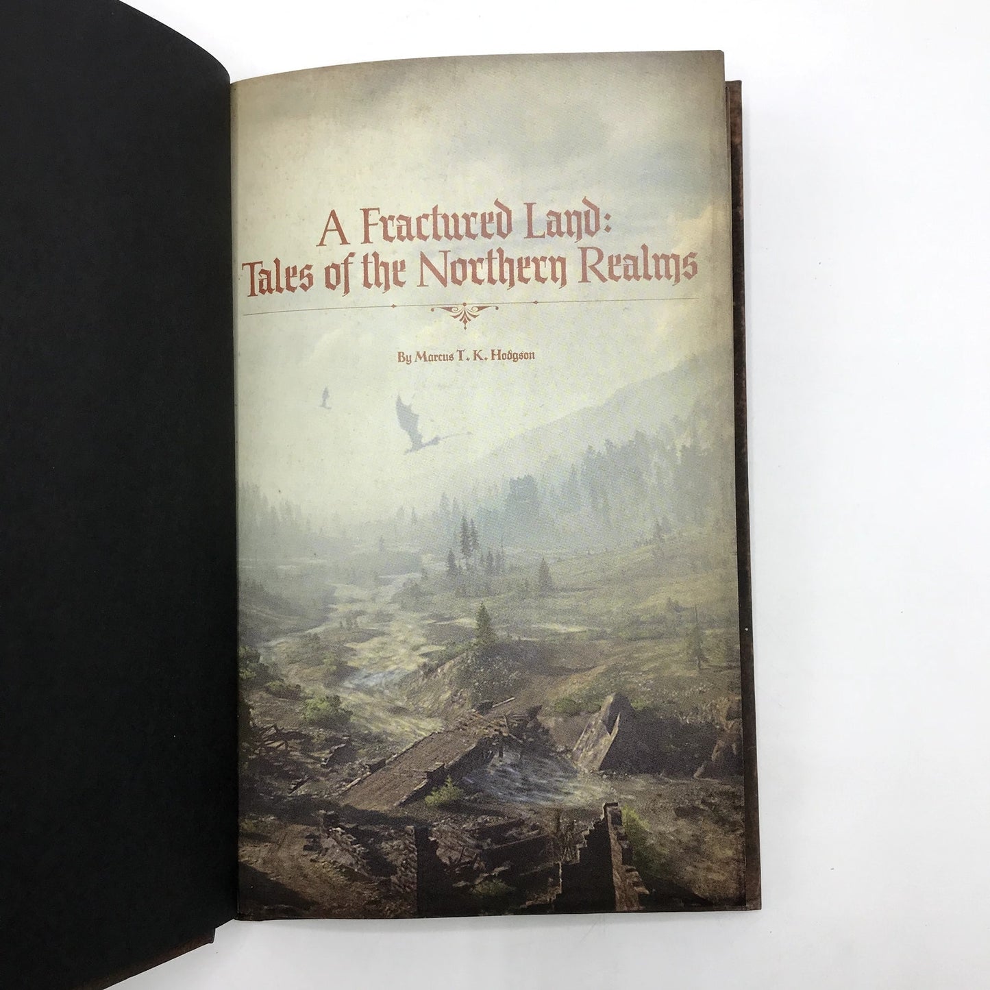 A Fractured Land: Tales of the Northern Realms by Marcus T. K. Hodgson Softcover