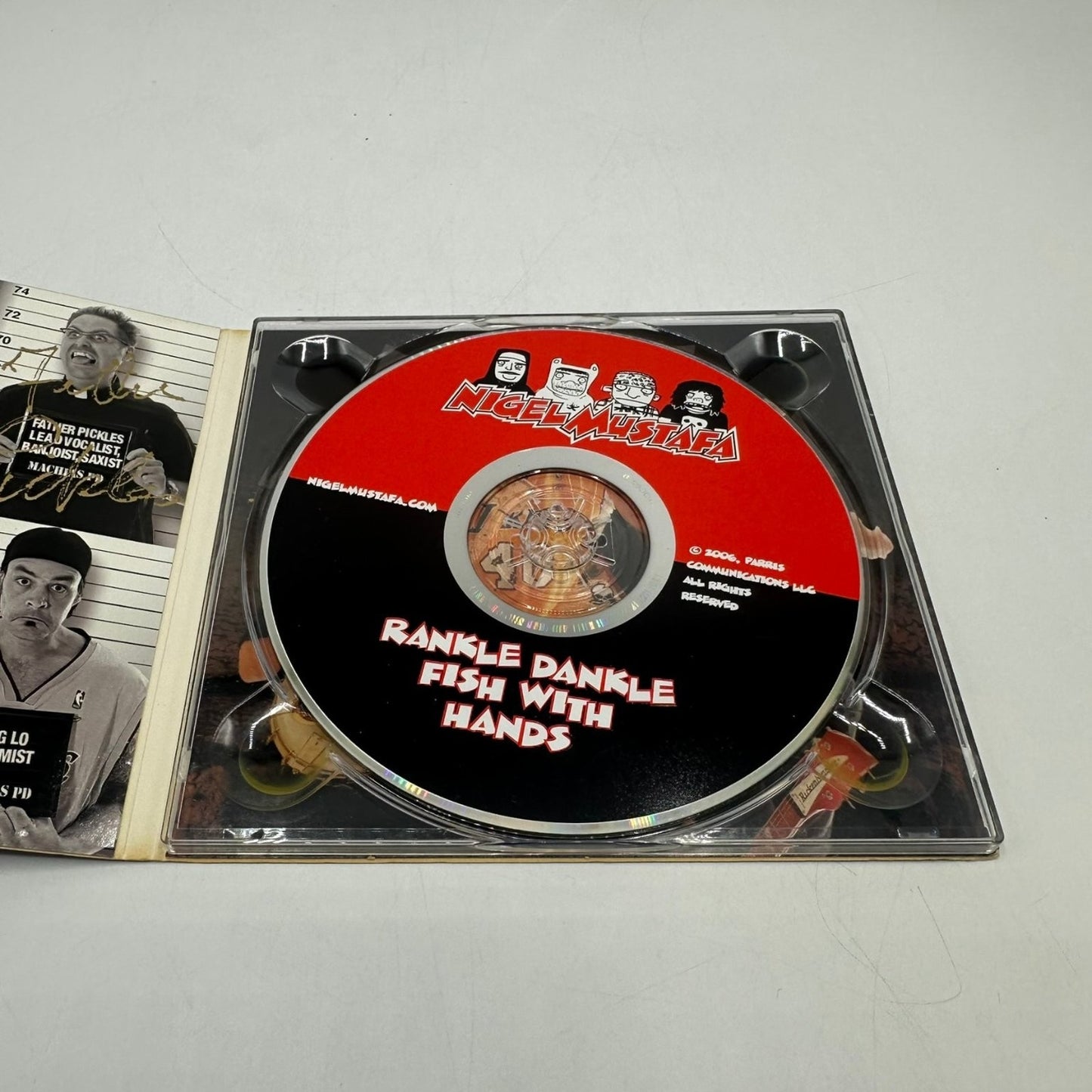 Nigel Mustafa – Rankle Dangle Fish With Hands CD 2006 SIGNED Comedy Parris