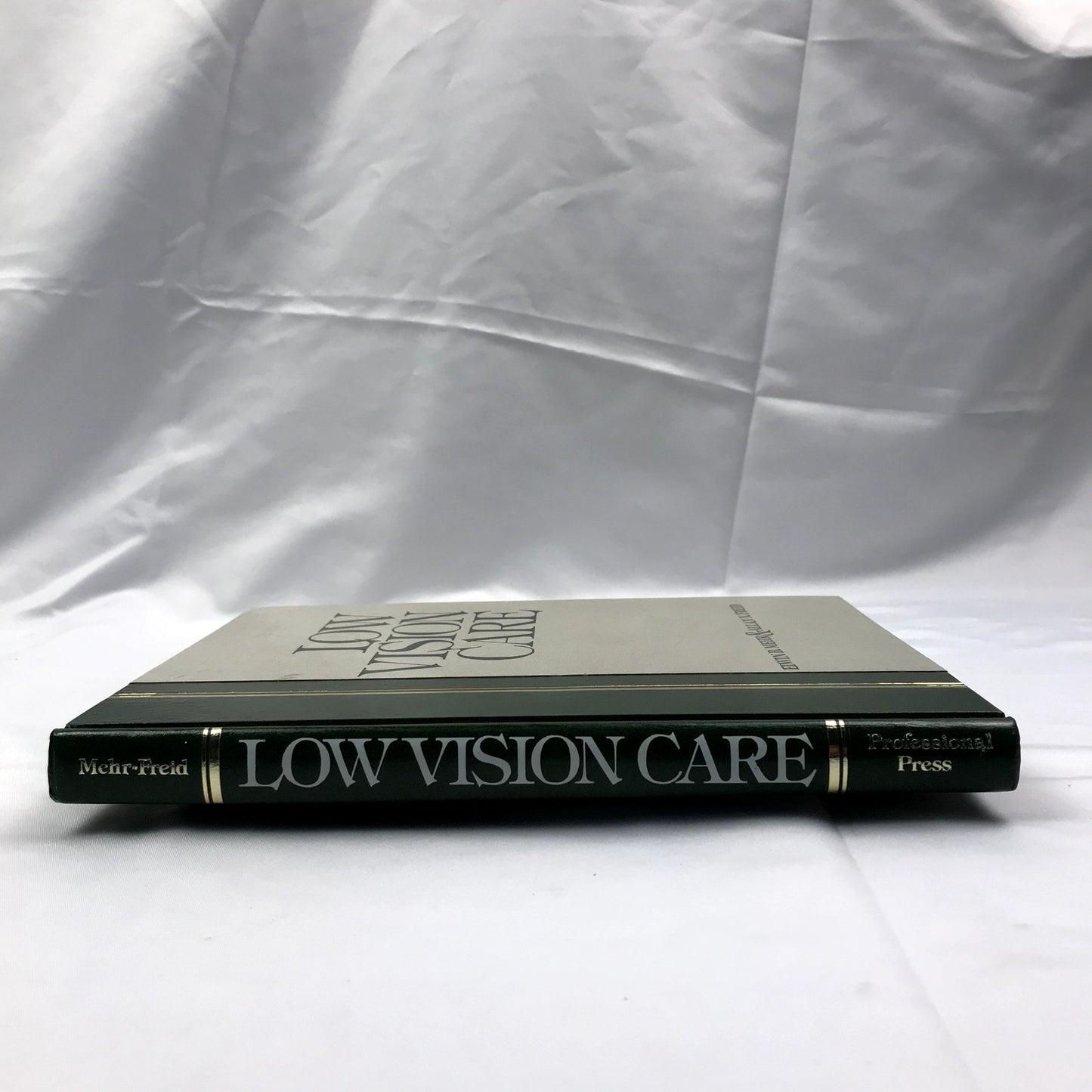 Low Vision Care 1st Edition Hardcover Book by Edwin B. Mehr, Allan N. Freid 1975